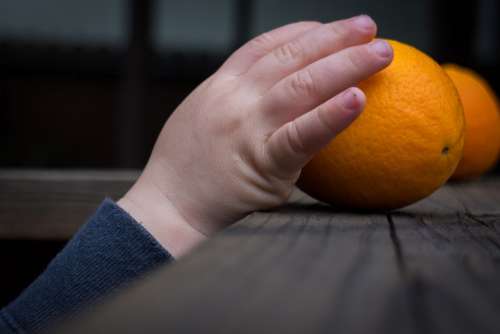 Hand Grabbing Taking Orange Child Reaching Fruit