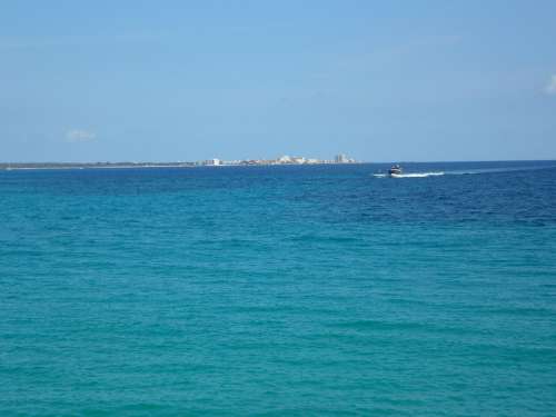 Horizon Sea Island Land In Sight Water Ocean Sky