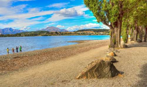 Lake Wanaka New Zealand Water Rocks Nature Green