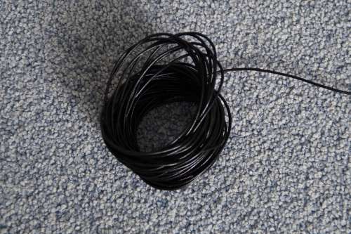 Lederband Cord Band Black Rolled Up Coiled