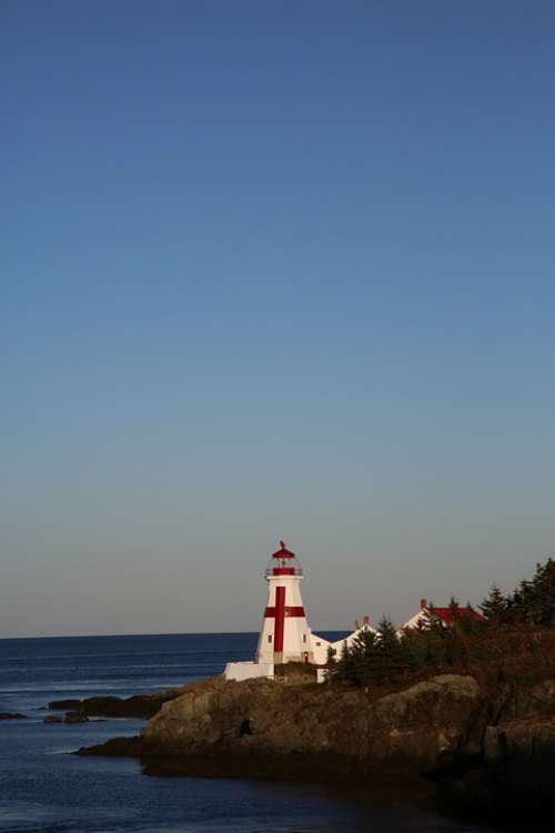 Lighthouse Canada Evening Sea Water Rock Coastal