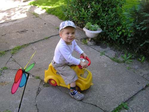 Little Boy Moped Garden