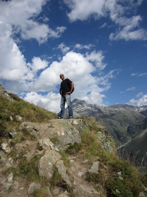 Man Top Of Mountain Alps Switzerland Sunny