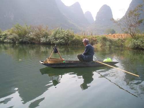Man Raft China Yangshuo River Mountains Water