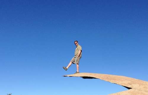 Man Balancing Cool Mountain Hiking Chip Rock