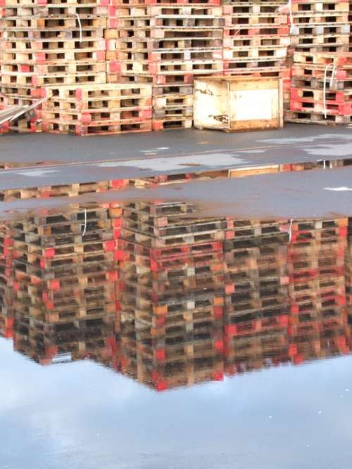 Mirroring Pallets Wood Red Puddle Industry