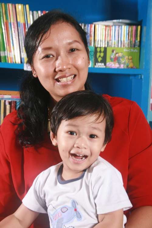 Mother Son Library Happy Kid Sitting Pose