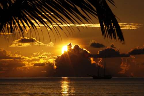 Ocean Sea Sailing Boat Sunset Rays Sunlight