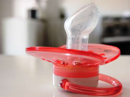 Pacifier Red Table A Children'S Toy