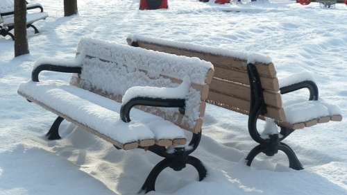 Park Benches Snow Covered Outside Winter Empty