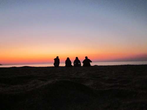 People Resting Silhouette Lake Sand Malawi