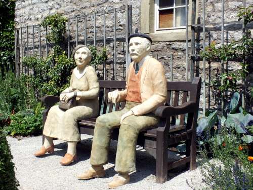 Rest Sculpture Man And Woman Pair Bank Summer