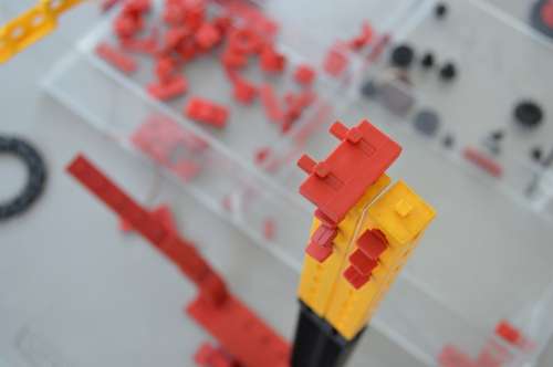 Robotic Kids Playing Lego School