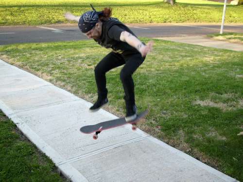 Skateboarding Skateboarder Sidewalk Jump Male