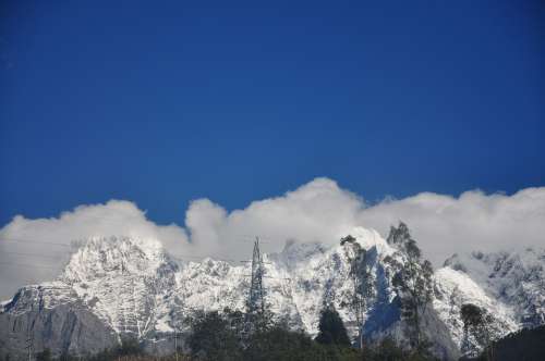 Snow Mountain In Yunnan Province Cloud Landscape