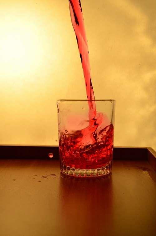 Splash Glass Liquid Red Pouring Alcohol Drink