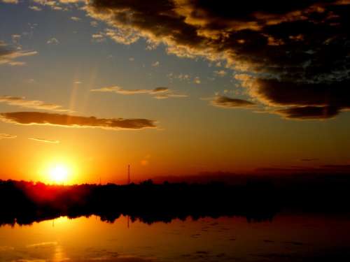 Sunset Sun In The Evening Water Landscape Cloud