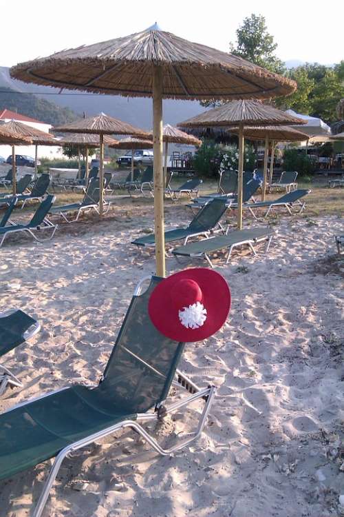 Tanning Beds Umbrella Hats Beach Sand