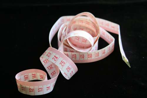 Tape Measuring Red White Centimeters Background
