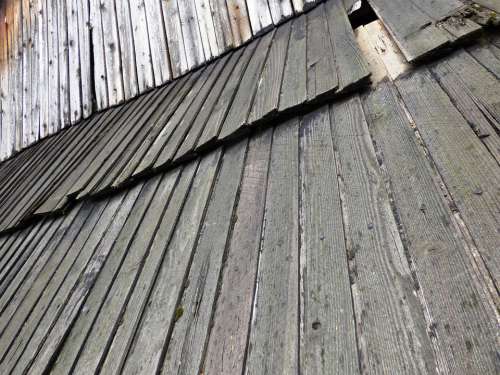 The Roof Of The Boards Cottage Village Damage