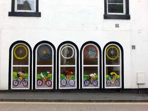 Wall White Building Windows Paintings Cyclists