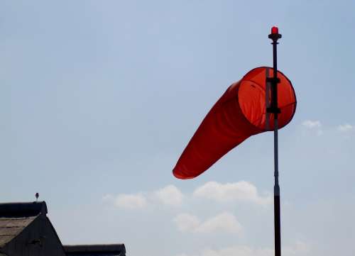 Windsock Orange Pole Blue Sky Hanger Roof Blowing