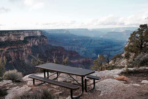 Picnic bench overlooking Grand Canyon, Arizona, USA