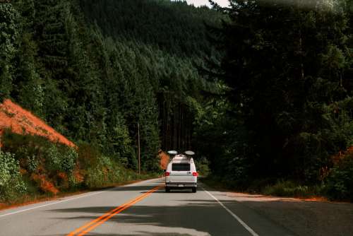 Van Driving Through Mountains Photo