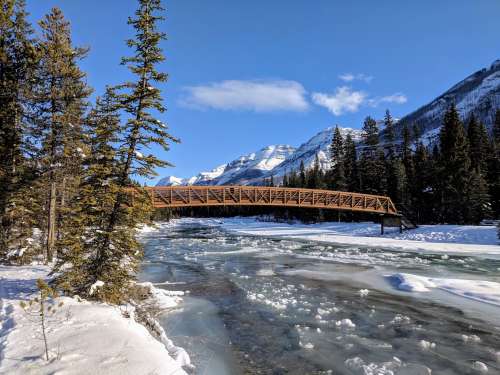 A Bridge Of A Frozen River Photo