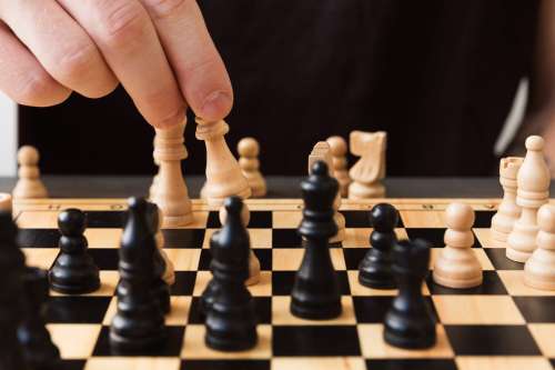 A Close Up Of A Game Of Chess Photo