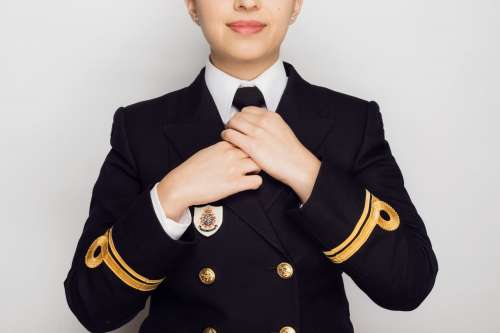 A Young Woman Looks Sharp In Her Navy Uniform Photo