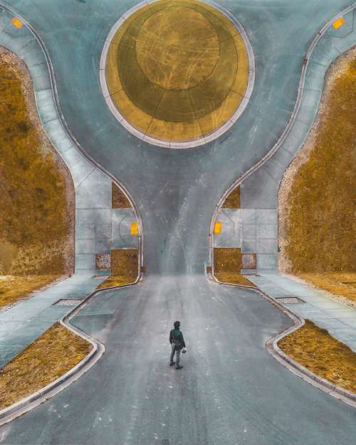 Abstract Image Of Man Standing In Road Photo