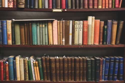 Antique Books On Shelves Photo