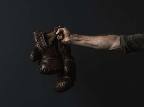 Antique Boxing Gloves In Hand Photo