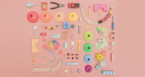 Assortment Of Toys On Pink Photo