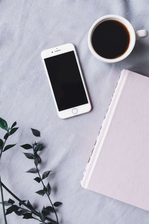 Black Coffee And Phone Flatlay Photo