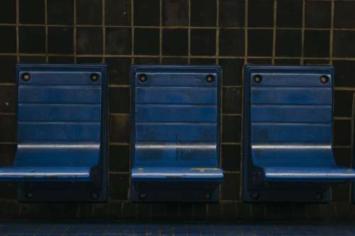 Blue Chairs On A Subway Platform Photo