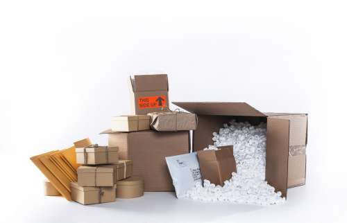 Boxes And Packages Arranged On Background Photo