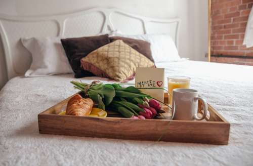 Breakfast On Bed With Flowers For Mom Photo