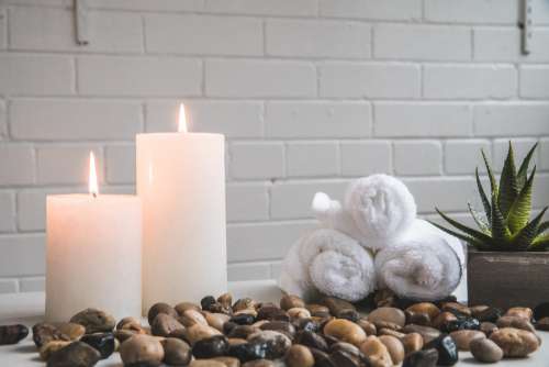 Candles Stones And Towels Photo