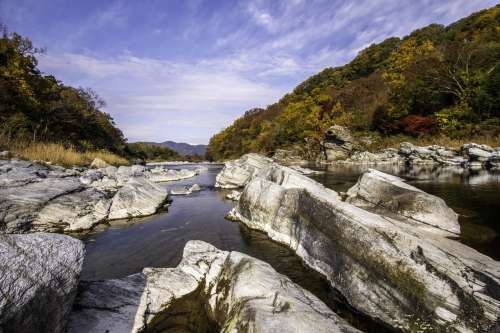 Clear Freshwater Through Rocks Photo