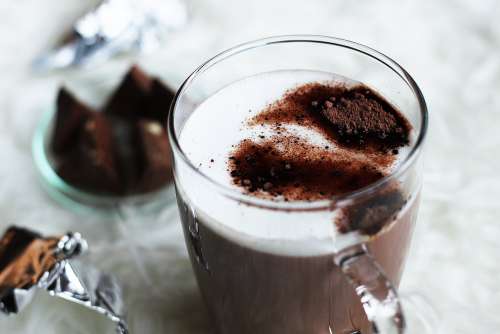 Close Up Of Hot Chocolate With A Sprinkle Of Cocoa And Brownies Photo