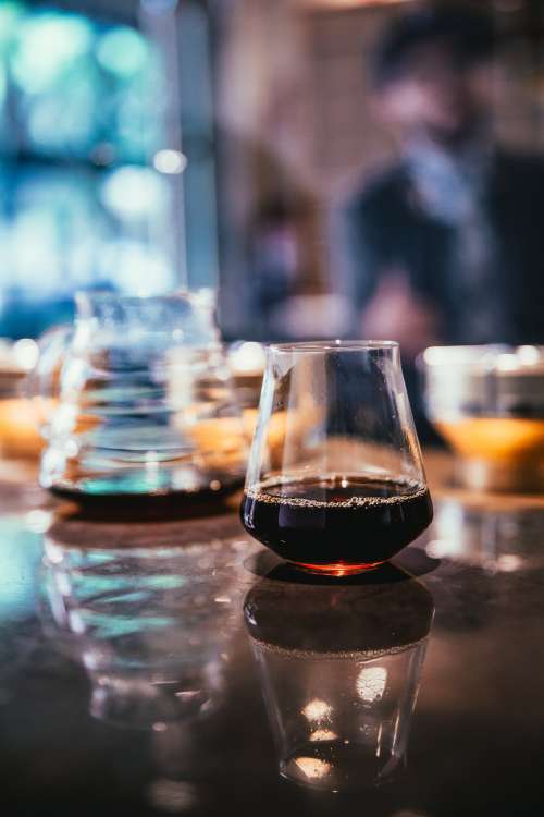 Coffee Process With Glassware At Cafe Photo