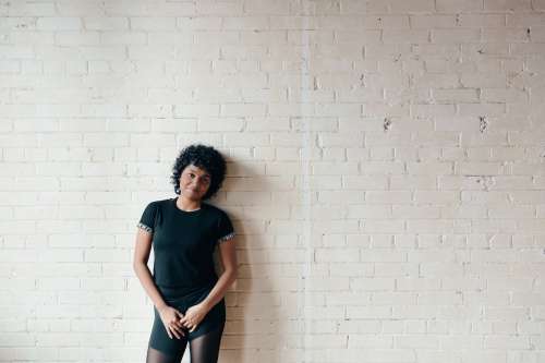 Curly Haired Woman Bricks Photo