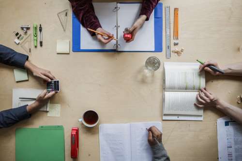 Four Students Study Flatlay Photo