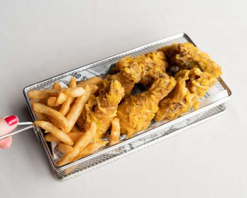 Fry Basket With Frites And Chicken Photo