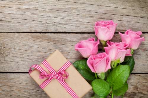 Gift And Roses Photo