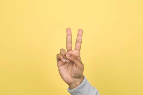 Hand With Two Fingers Up Peace Photo
