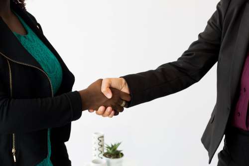 Handshake In Modern Office Photo