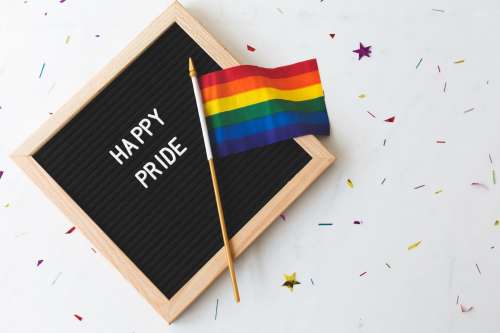 Happy Pride Sign With Flag Photo